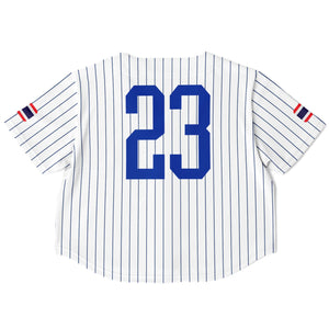 White pinstriped short-sleeve jersey with large blue number 23 on the back, shown flat against a white background.