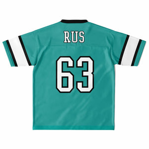 A teal short-sleeve football-style jersey shown from the back, with white lettering reading 'RUS' above large white number '63' outlined in black. The sleeves have white and black stripes, and the collar is black.